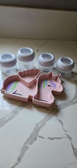Baby bottles and plate good condition