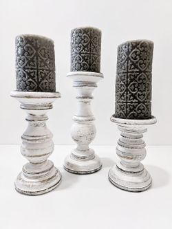 Set Of 3 Distressed White Wooden Pillar Candle Holders With Gray Embossed Candles