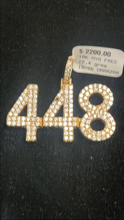 Iced out 448 pendant 10k gold