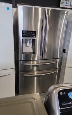 GE Side By Side Stainless Steel Fridge
