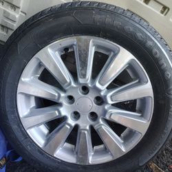 TIRE WITH RIM LIKE NEW NEVER USED