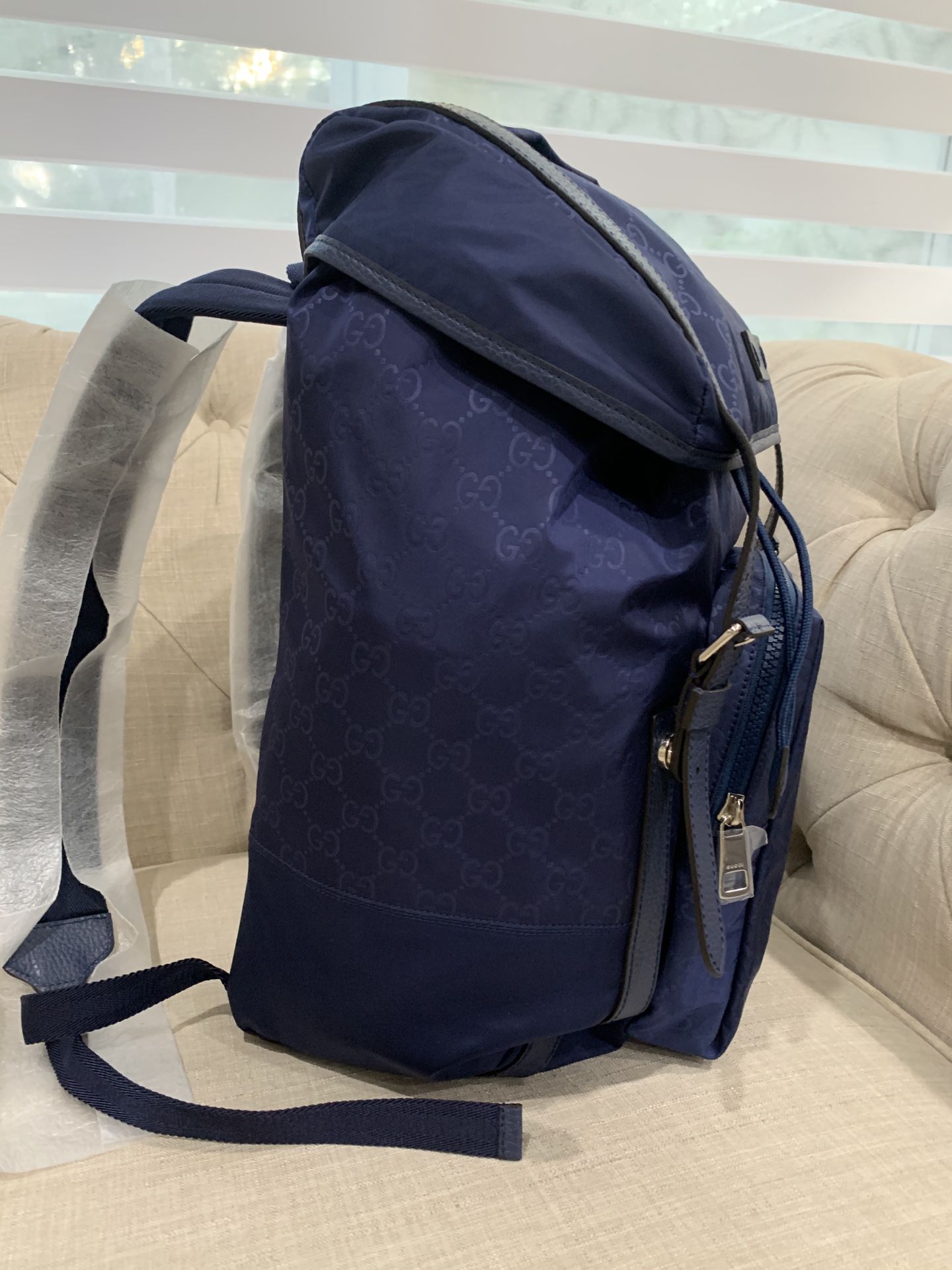 Preloved GUCCI Blue Nylon GG Canvas Large Light Double Buckle Backpack –  KimmieBBags LLC