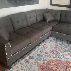 Brand new brown linen Sectional Sofa with 2 accent pillows.