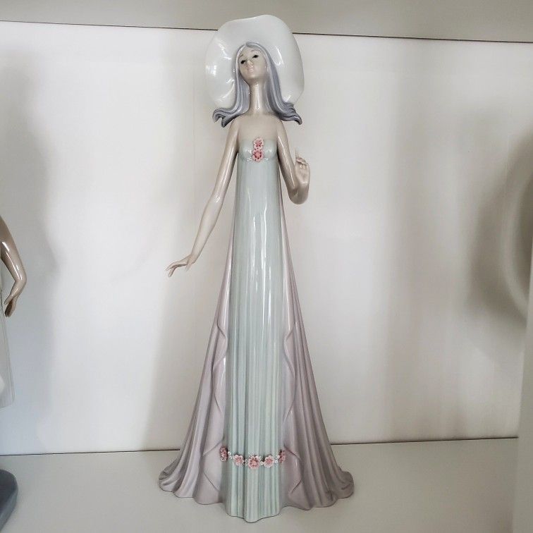 Lladro Woman Figurine
