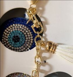 NEW "EVIL EYE" by Eye Candy, WITH BLING HEART