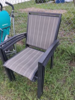 THREE NICE MATCHING STACKABLE PATIO CHAIRS