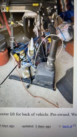 Bruno brand wheelchair or scooter lift for back of vehicle