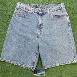 Vintage 1990s Levi 550 orange tab Jean shorts