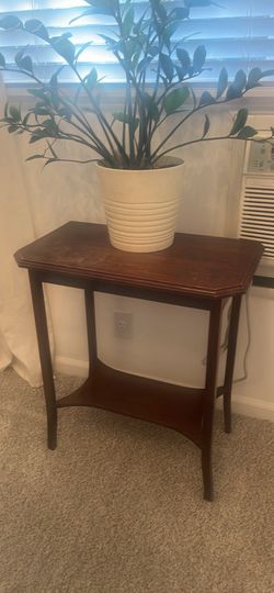 Vintage mahogany two tier side table with scalloped apron