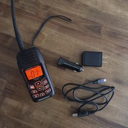 Handheld marine radio and emergency beacon
