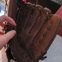 Brown leather Wilson baseball mitt