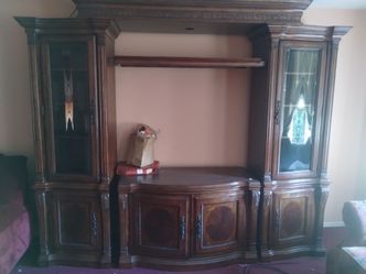 Very good condition just like brand new entertainment center buffet and China set