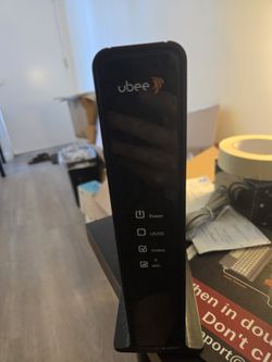 Uber (Modem + Wifi Router) And Netgear Wifi Router