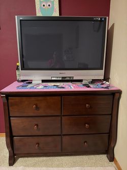 Panasonic Flat Screen TV and dresser