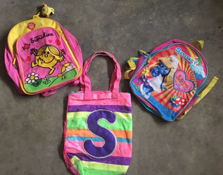 2 backpacks and a S sequins JUSTICE bag. $5 each. Been in storage and need cleaned