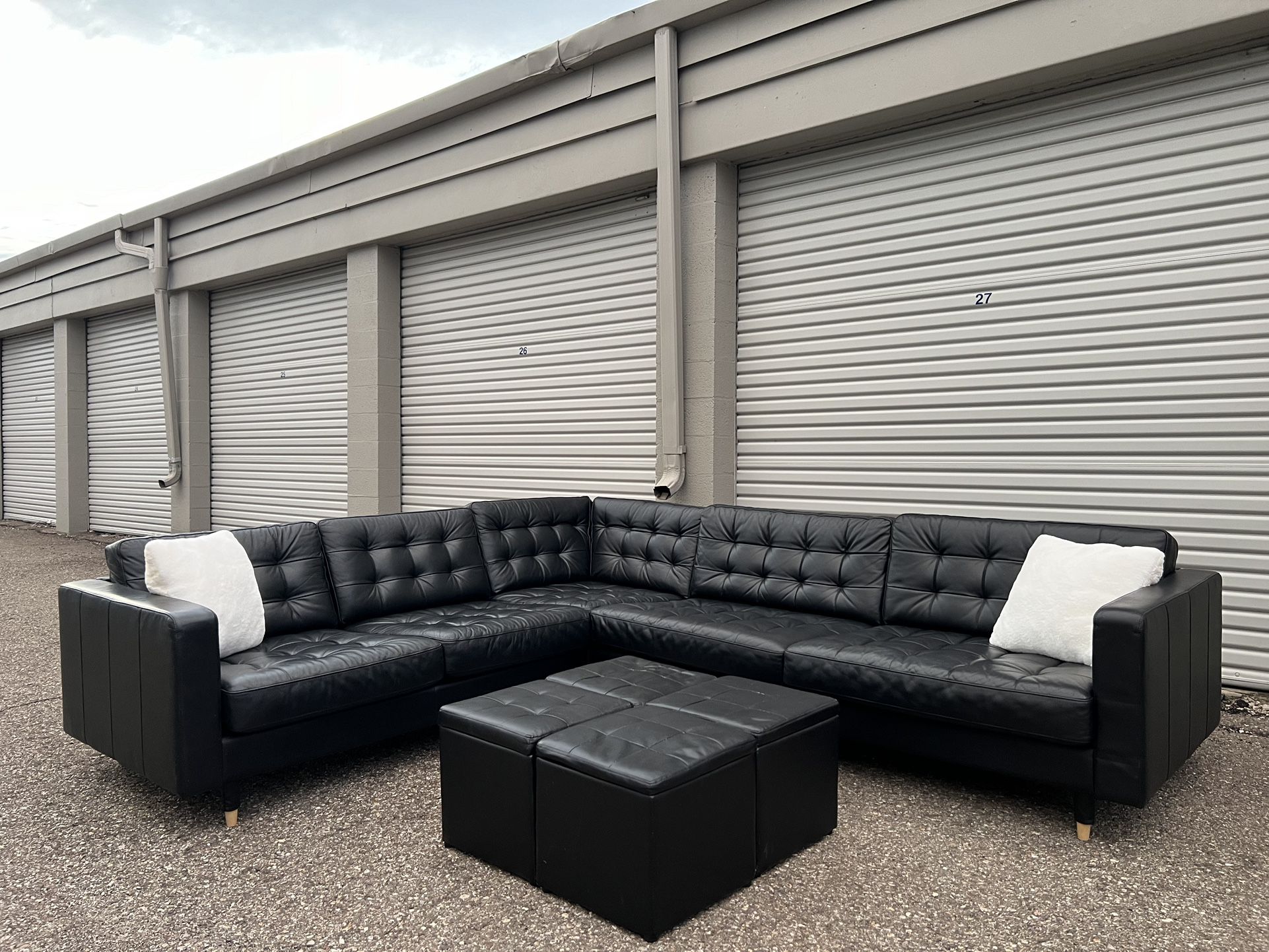 Delivery Available •Black Leather Sectional Couch And Ottoman