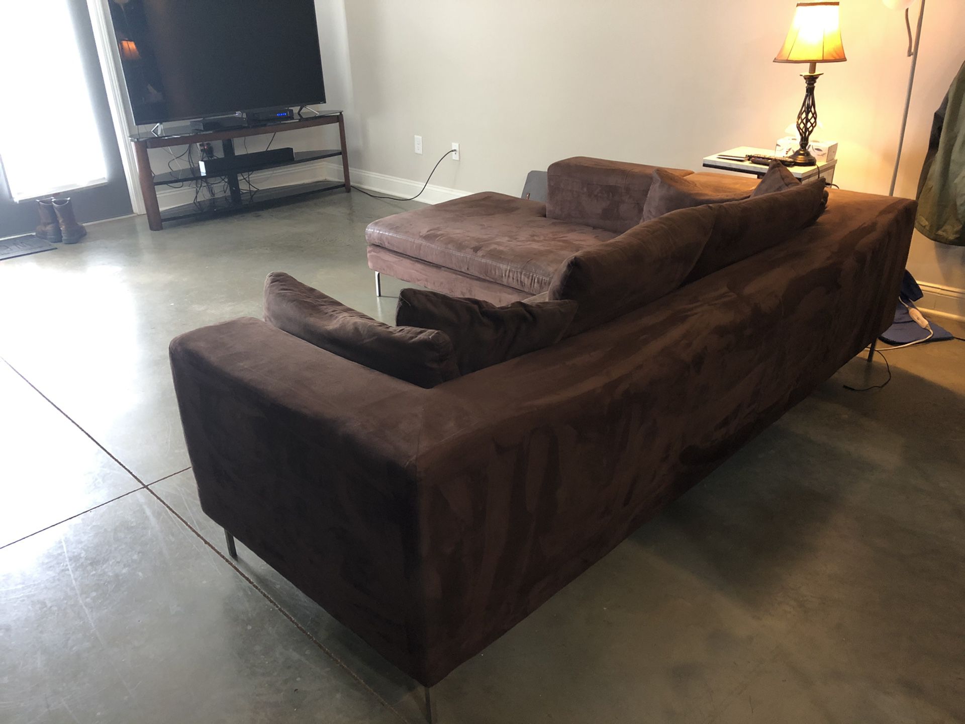 Metal frame brown micro fiber couch with ottoman that can be placed on either side