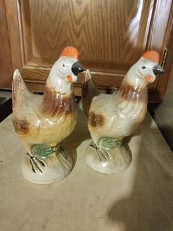 Two ceramic hens and dolphins for $10