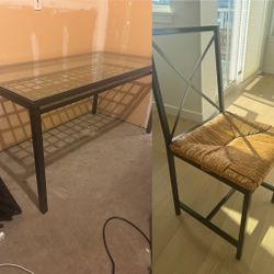 Glass top table and four chairs