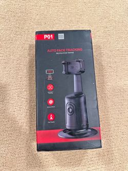 Auto face tracking tripod