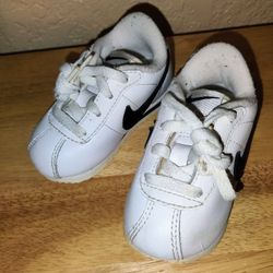 Baby Sneakers Size 2 • by Nike • Fabric Is Discolored 
