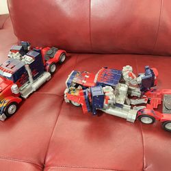 Transformers Optimus Prime 11" Figure 2 pieces  1 is broken details in the last photo