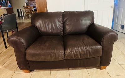 Free leather loveseat.