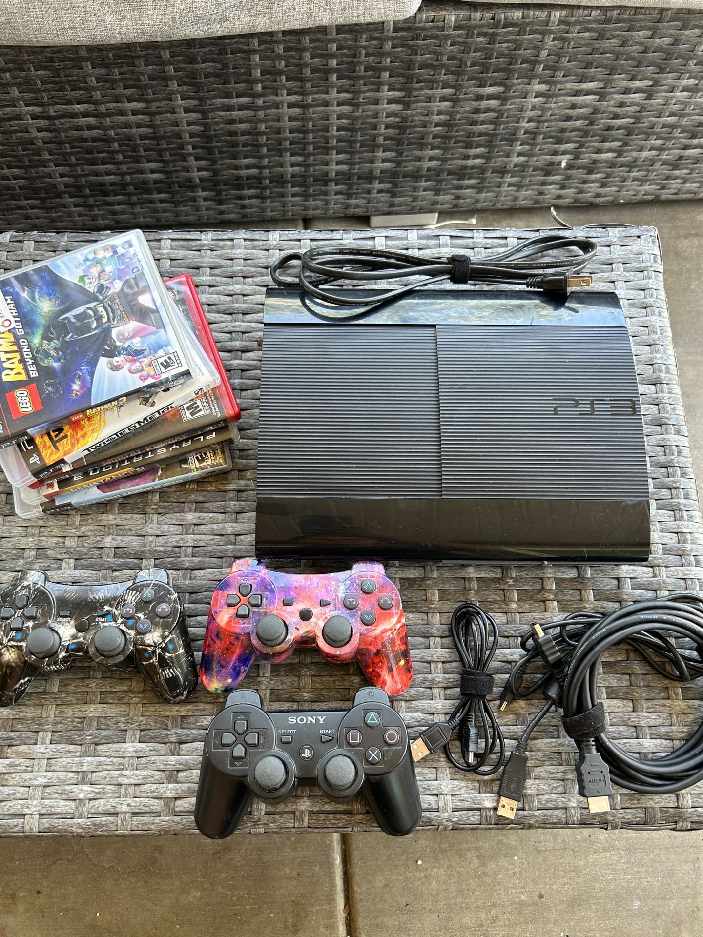 PS3 Super Slim Console 3 Controllers And Games