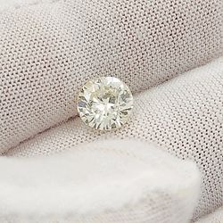 1.40 Carat I2, Color M, Round Brilliant Cut Natural Diamond.