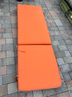 1x orange chaise cushion Located in concord Some stains (easily cleaned ) No rips or tears Measures: 78” long; 25”wide $50 or best offer