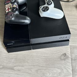 PS4 With 2 Controllers And Games (Bundle)