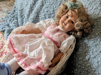Porcelain doll/ Shirley Temple all porcelain