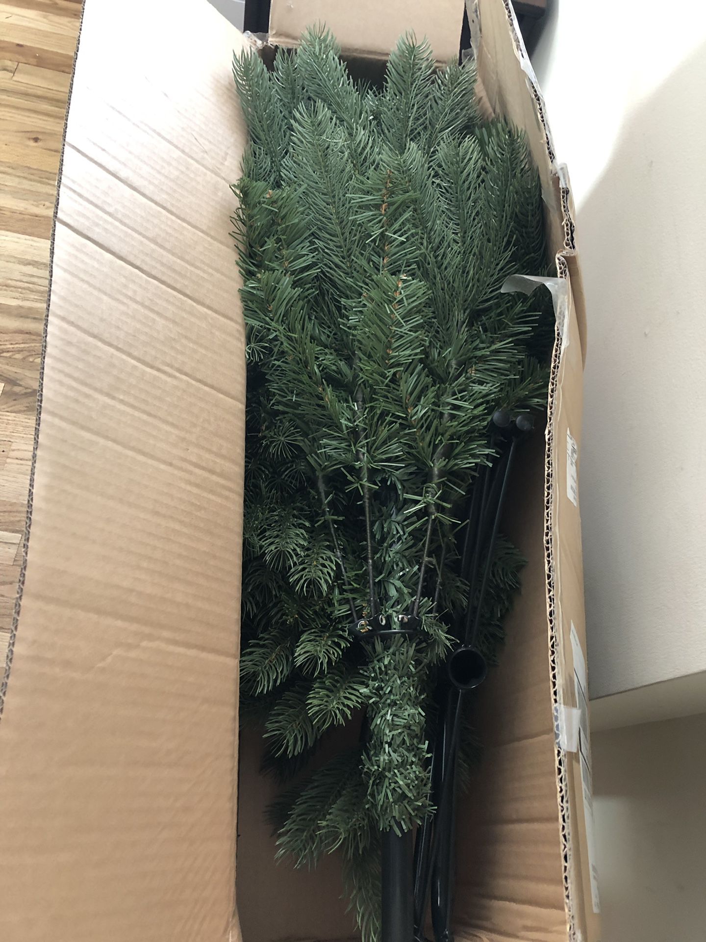Artificial Christmas tree 4 feet tall, stand included