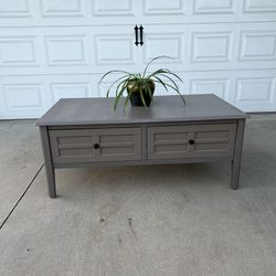 Brown Coffee Table With Black Hardware 