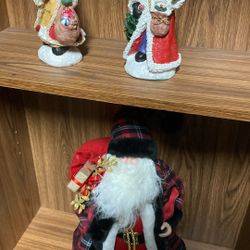 Four Santa Figurines