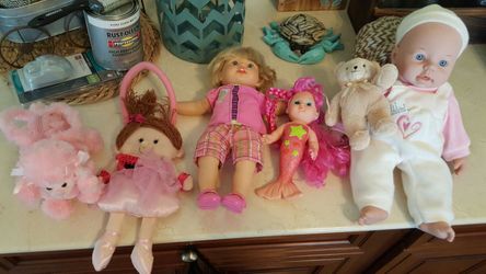 Dolls and purses 10.00 for all. All new or like new