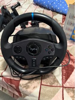 Racing wheel set with pedals and gear shift used 5 times only