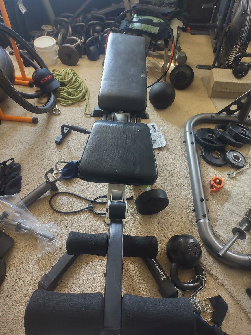 Weight Bench With Leg And Arm Curl Attachment