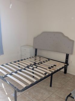 Full/queen sized headboard with full size bed frame