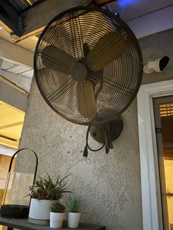 Wall mount outdoor fan