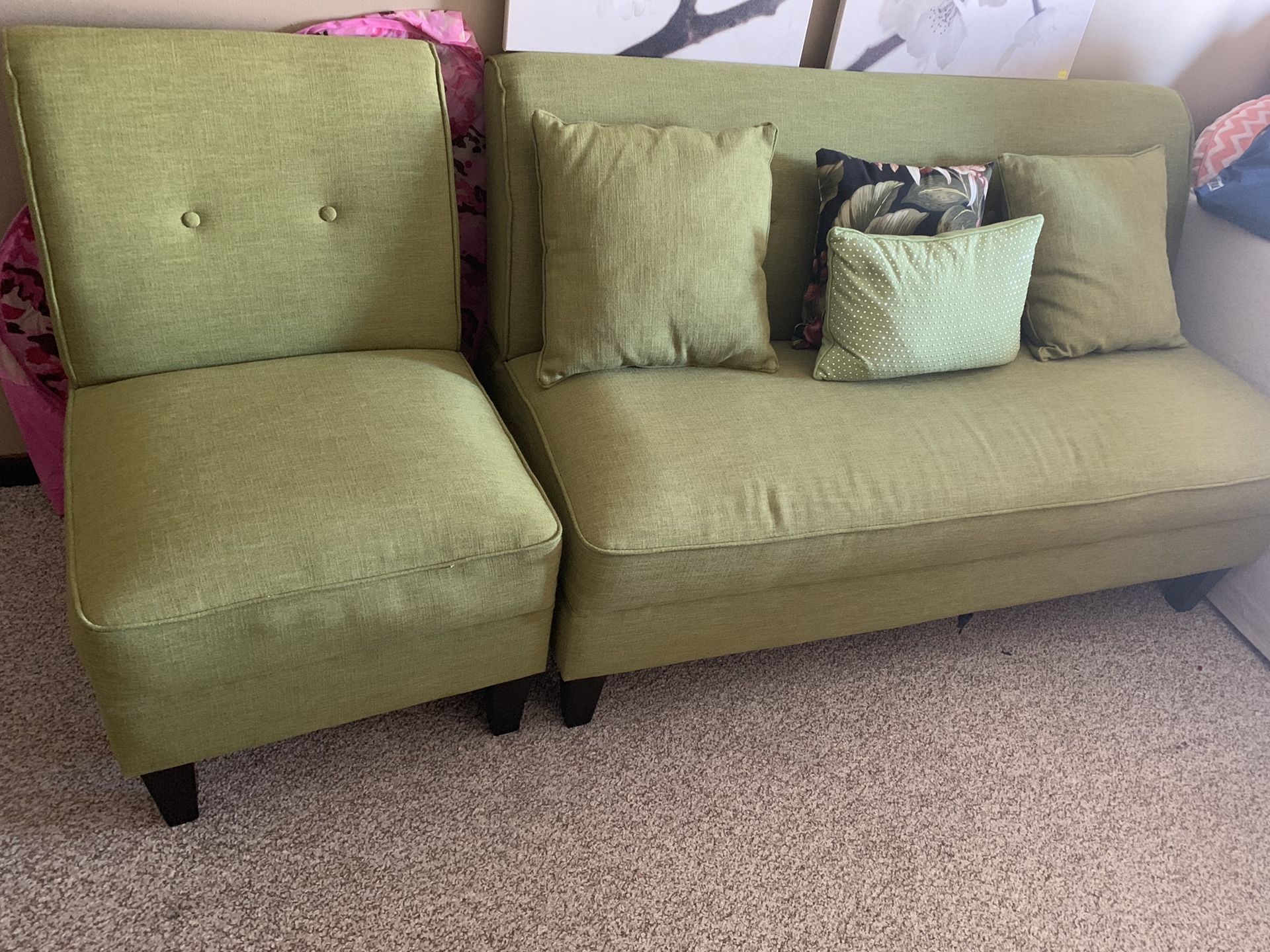 Tropical green sofa with matching chair and throw pillows