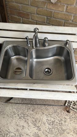 Kitchen sink with faucet