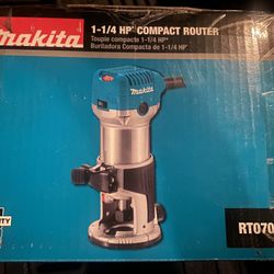 Makita 6.5 Amp 1-1/4 HP Corded Fixed Base Variable Speed Compact Router with Quick-Release