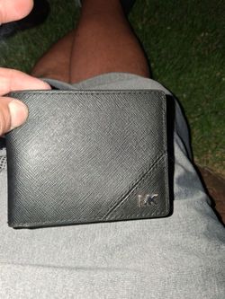 Black leather Michael Kors wallet