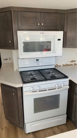 Like new 2018 whirlpool refrigerator, stove, and microwave