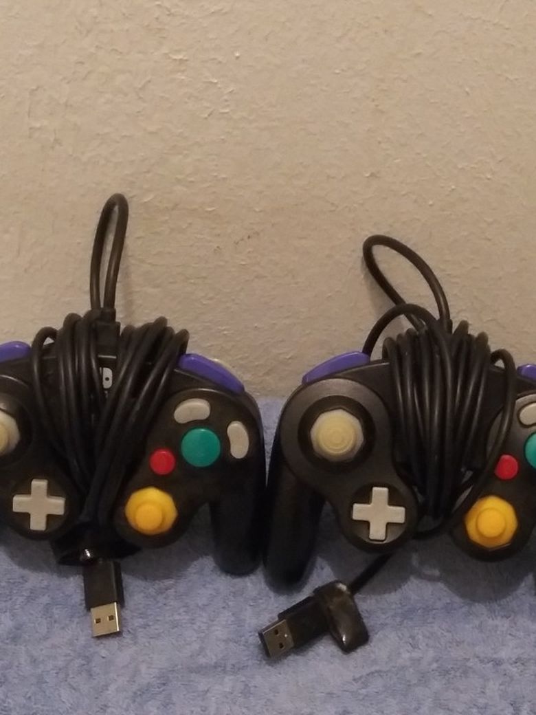 (2) NINTENDO SWITCH CONTROLLERS