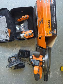 Rigid brushless 1/2 inch mid torque impact wrench  and 7 1/4 circular saw with 4ah battery