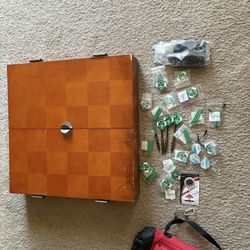 Cork, dartboard and holder and dart accessories.