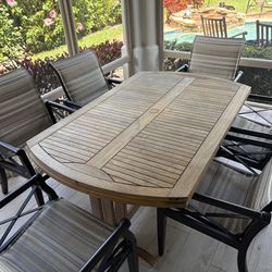 Expandable Teak table with 6 chairs with arms