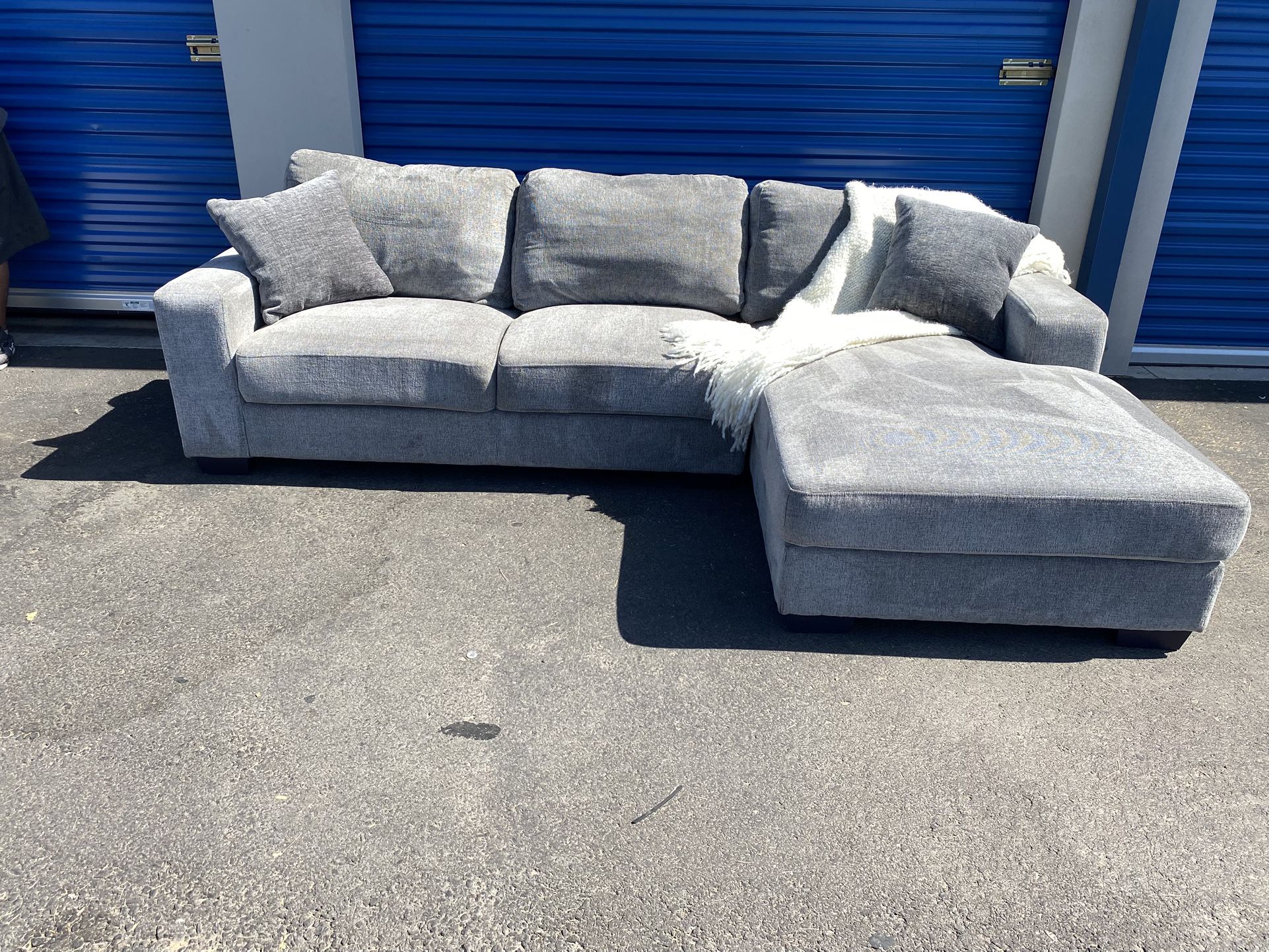Grey L-shaped sectional by American furniture